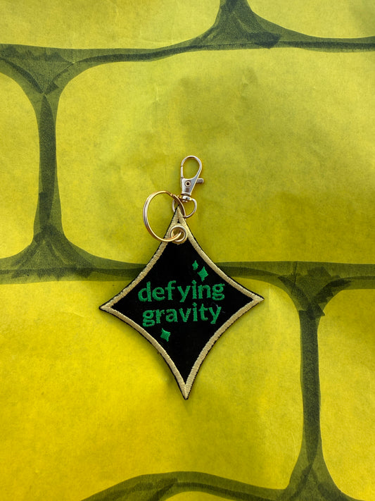 Defying Gravity Keychain